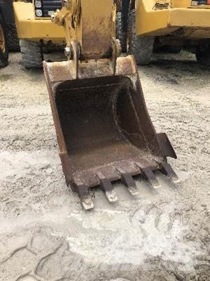 CAT 320 Гусеничні екскаватори
