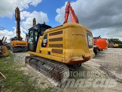 CAT 320 Гусеничні екскаватори