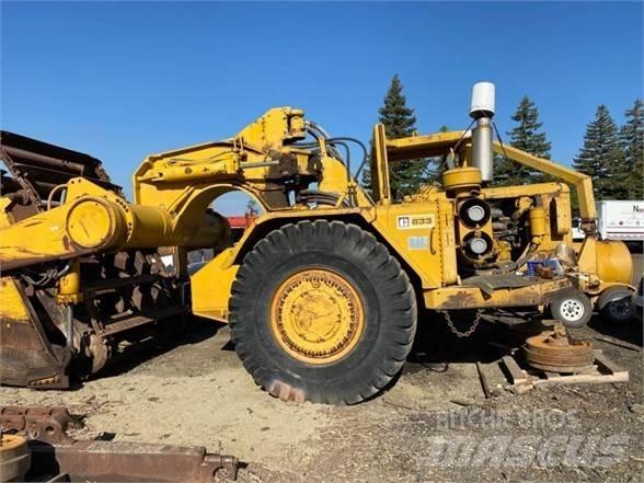 CAT 633 Скрепери