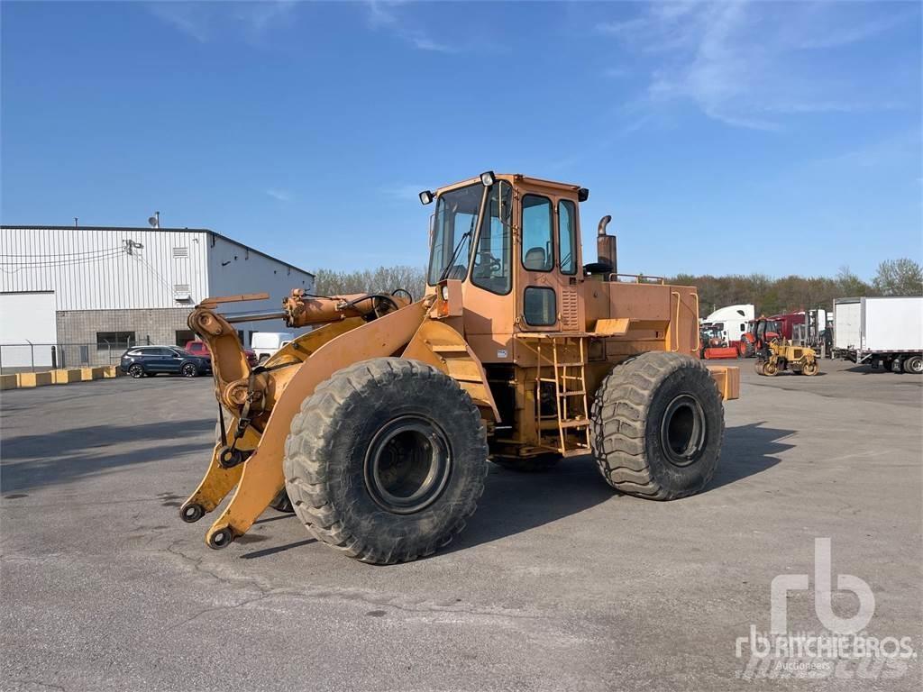 John Deere 744E Фронтальні навантажувачі