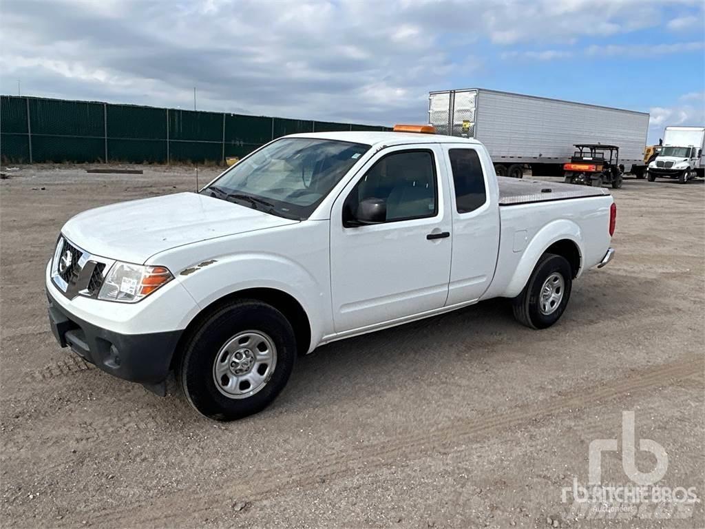 Nissan FRONTIER Пікапи / Бічне розвантаження