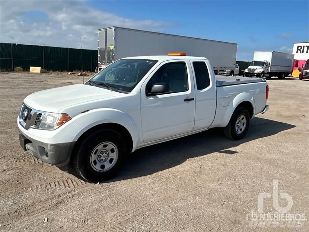 Nissan FRONTIER Пікапи / Бічне розвантаження