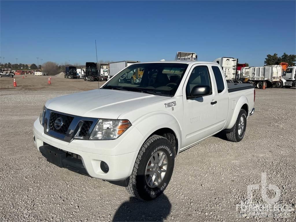 Nissan FRONTIER Пікапи / Бічне розвантаження