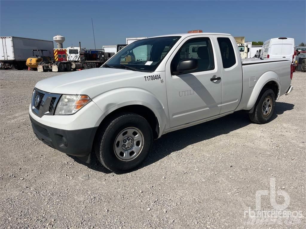 Nissan FRONTIER Пікапи / Бічне розвантаження