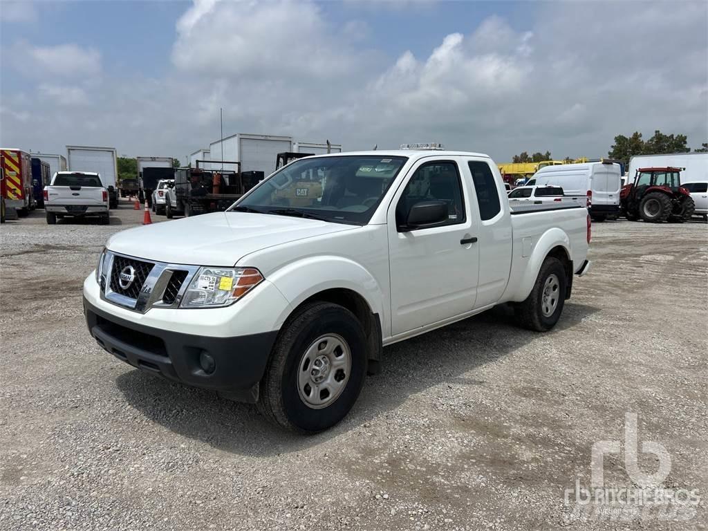 Nissan FRONTIER Пікапи / Бічне розвантаження