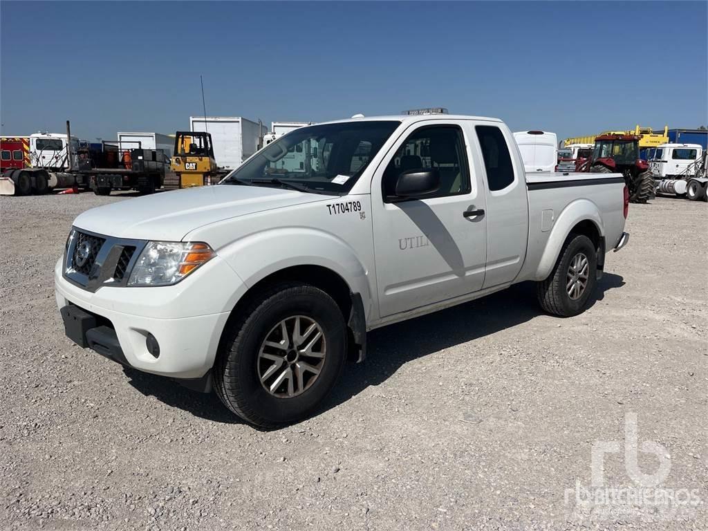 Nissan FRONTIER Пікапи / Бічне розвантаження
