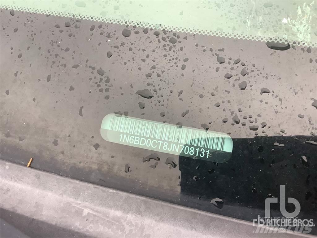 Nissan FRONTIER Пікапи / Бічне розвантаження
