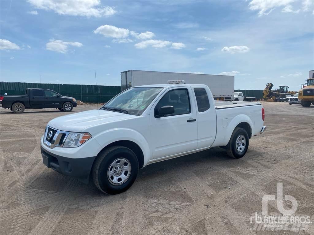 Nissan FRONTIER Пікапи / Бічне розвантаження