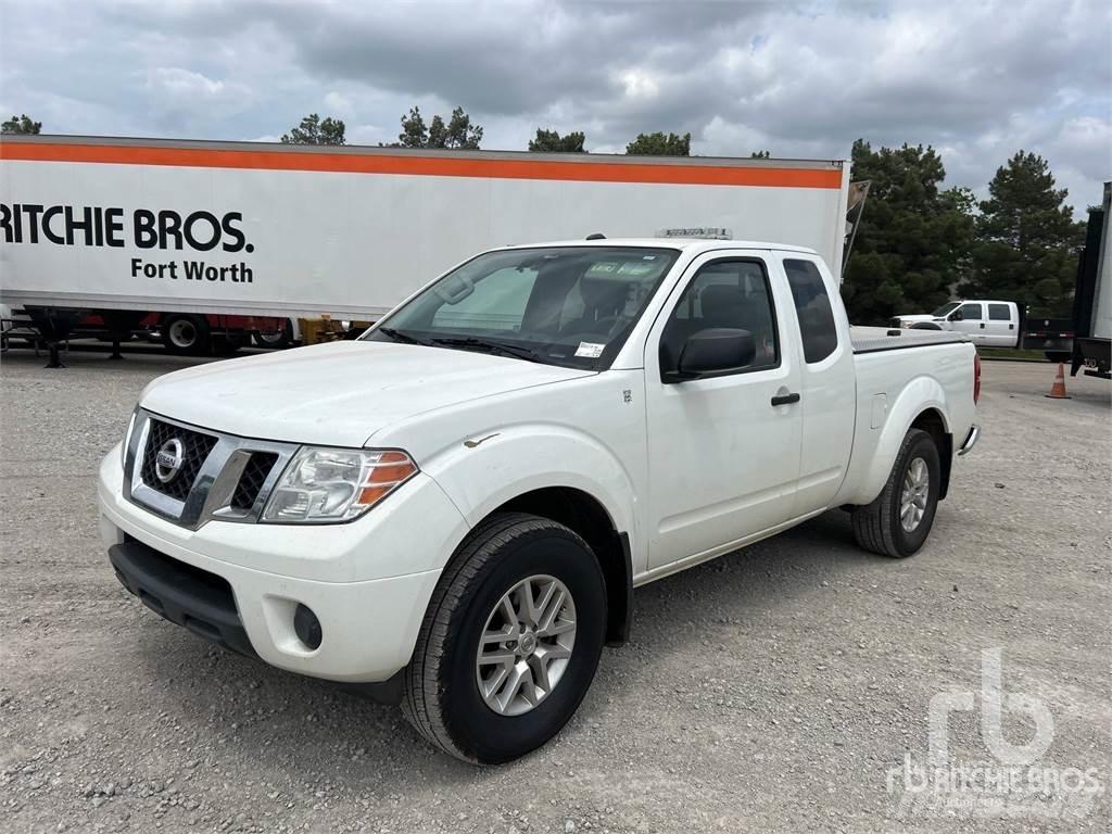 Nissan FRONTIER Пікапи / Бічне розвантаження