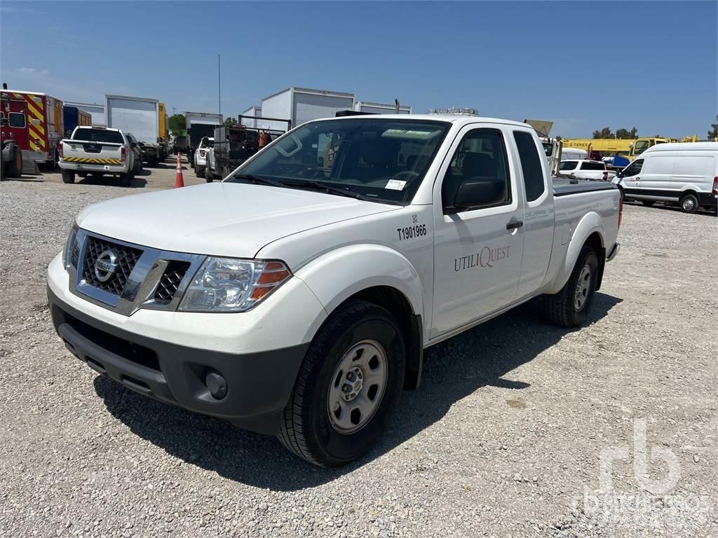 Nissan FRONTIER Пікапи / Бічне розвантаження