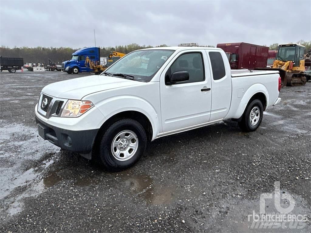 Nissan FRONTIER Пікапи / Бічне розвантаження