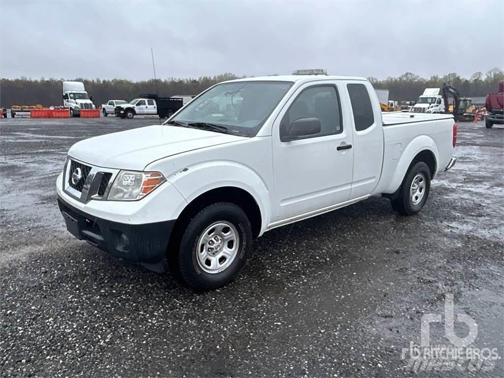 Nissan FRONTIER Пікапи / Бічне розвантаження