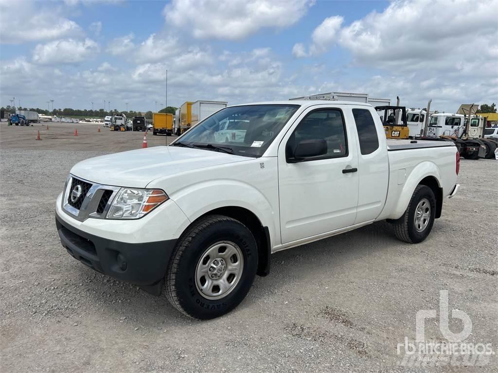Nissan FRONTIER Пікапи / Бічне розвантаження