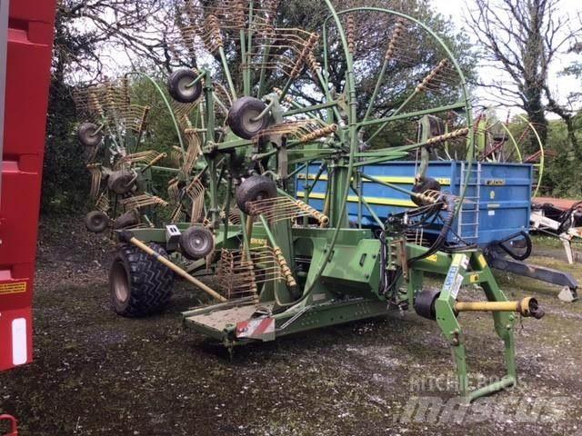 Krone 1400+ Граблі і сінозворушувачі