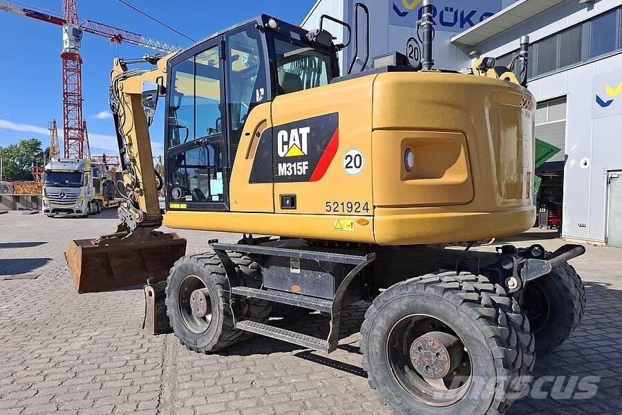 CAT M 315 F Колісні екскаватори