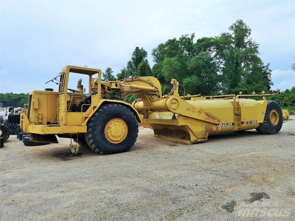 CAT 631D Поливальні машини