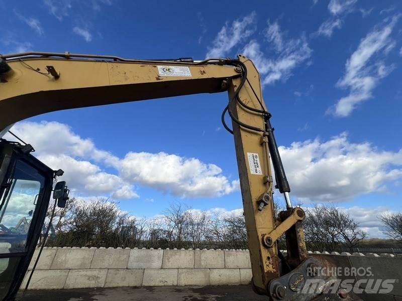 CAT 312DL Гусеничні екскаватори