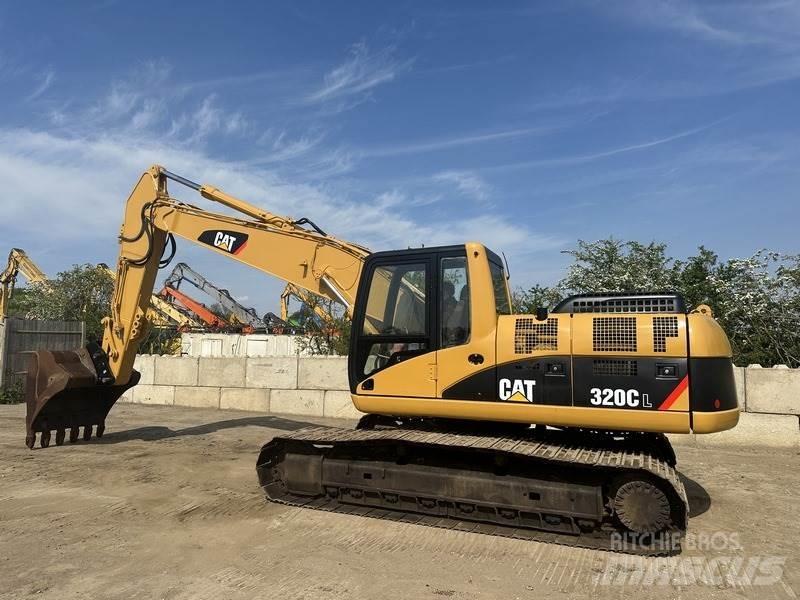 CAT 320 Гусеничні екскаватори