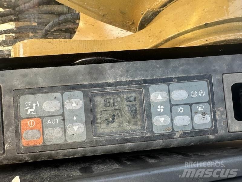 CAT 320 Гусеничні екскаватори