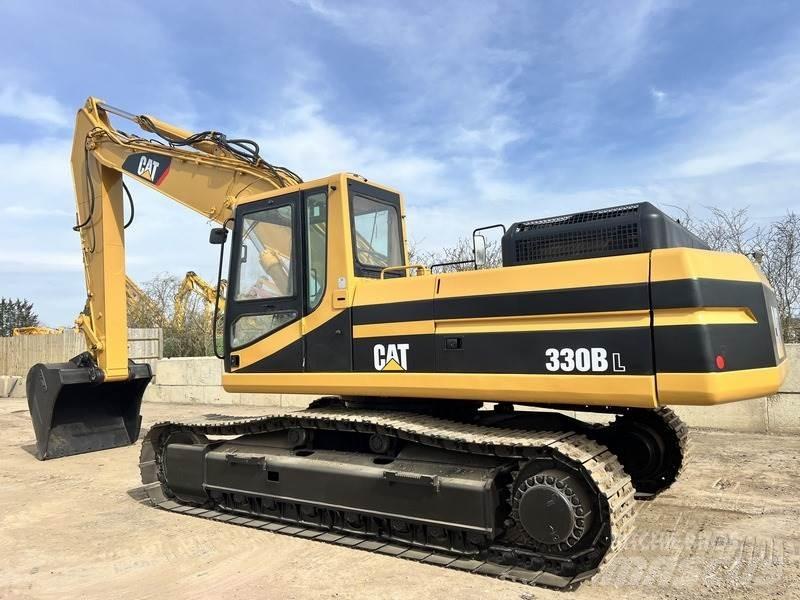 CAT 330. Гусеничні екскаватори