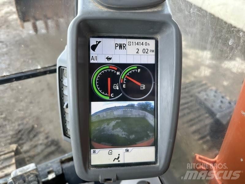 Hitachi ZX135 Гусеничні екскаватори