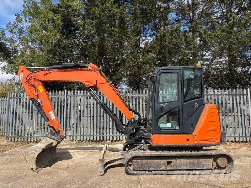 Hitachi ZX65 Середні екскаватори 7т. - 12т.