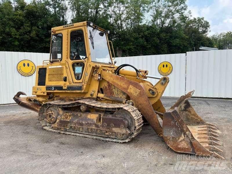 CAT 943 Гусеничні вантажники