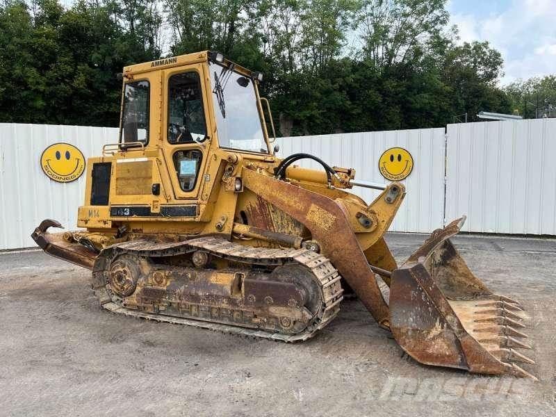 CAT 943 Гусеничні вантажники