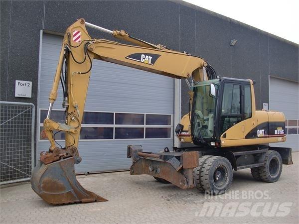 CAT M315C Колісні екскаватори