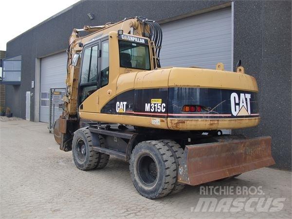 CAT M315C Колісні екскаватори