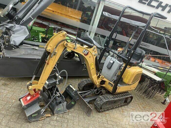 CAT 300.09D Колісні екскаватори