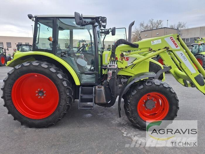 CLAAS AXOS 320 C Трактори