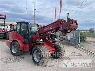 Schäffer 9330T Фронтальні навантажувачі