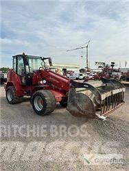 Schäffer 9630T Фронтальні навантажувачі