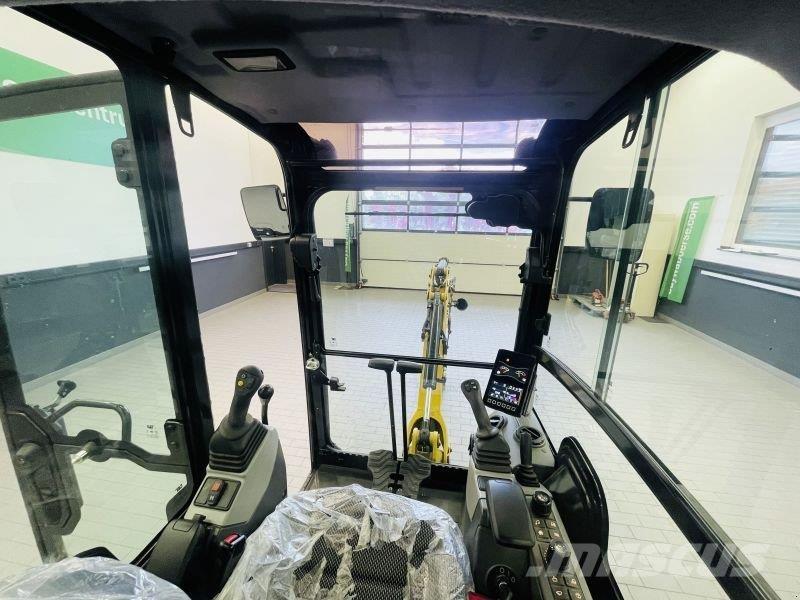 CAT 302CR-05A Колісні екскаватори