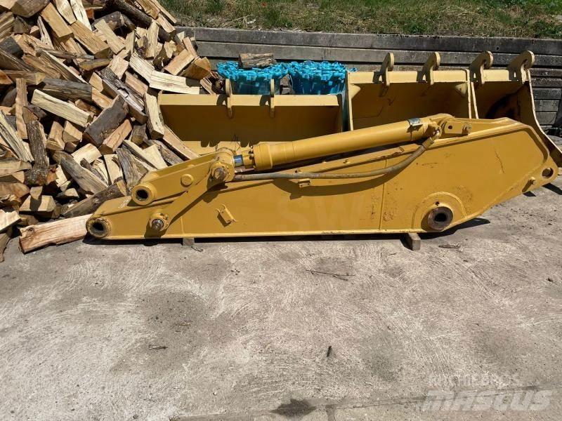 CAT 320 Бони і ковші