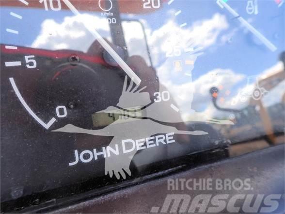 John Deere 110 Екскаватори-навантажувачі