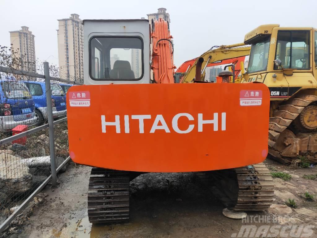 Hitachi EX 60 Гусеничні екскаватори
