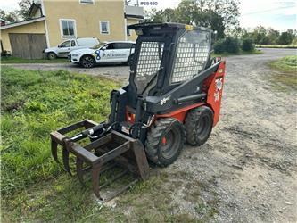 Thomas T85 Skid steer with attachments