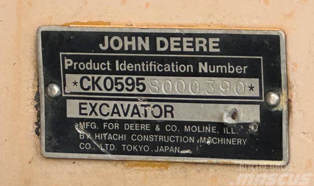 John Deere 595 Колісні екскаватори
