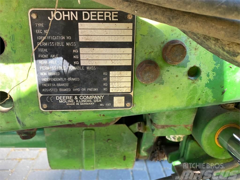  John Deere-5820 Трактори