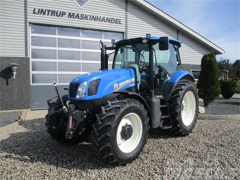 New Holland T6050 Delte med frontlift Трактори